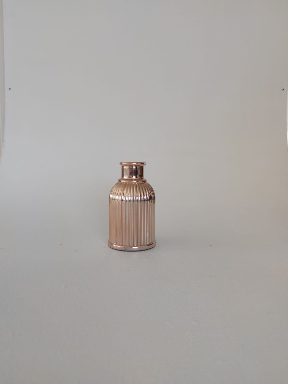 Rose gold single flower display