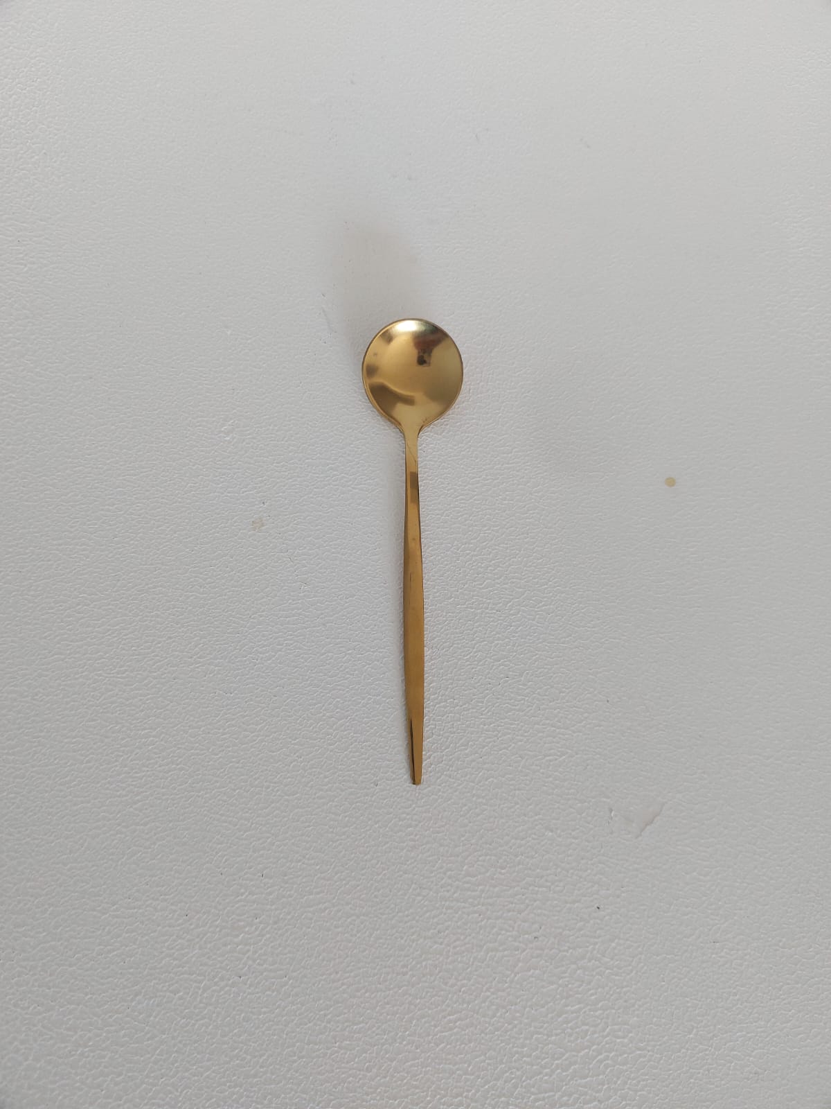 Rounded Gold spoon